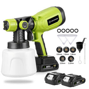 Green spray gun with accessories on a white background